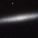 Illustration for article titled When Is a Spiral Galaxy Just a Disc? When Its Viewed From the Side.